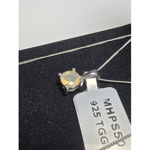 186 - As New Pretty 925 Silver Solitaire pendant inset with a genuine Ethiopian Opal stone presenting exce... 