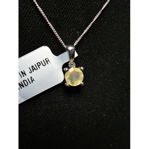 186 - As New Pretty 925 Silver Solitaire pendant inset with a genuine Ethiopian Opal stone presenting exce... 