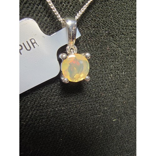 186 - As New Pretty 925 Silver Solitaire pendant inset with a genuine Ethiopian Opal stone presenting exce... 