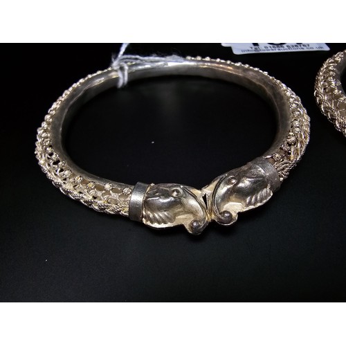 187 - 2x matching Sterling Silver ornate bangles featuring an elephant head and ornate filigree design bot... 