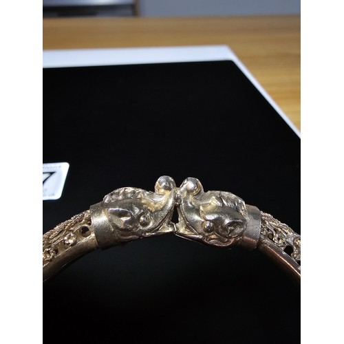 187 - 2x matching Sterling Silver ornate bangles featuring an elephant head and ornate filigree design bot... 