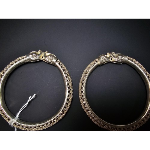 187 - 2x matching Sterling Silver ornate bangles featuring an elephant head and ornate filigree design bot... 