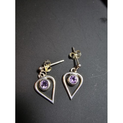 191 - Pair of 925 Silver drop earrings inset with amethyst stones in clean condition - boxed.