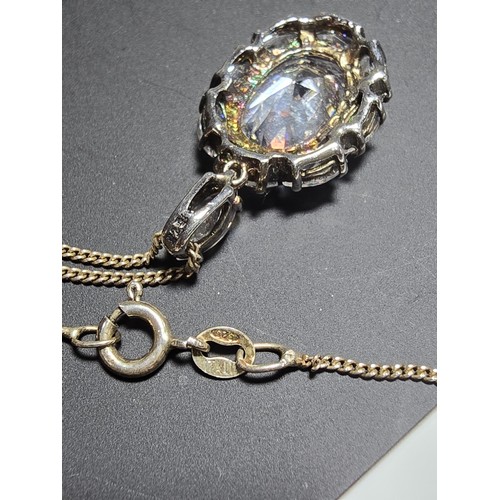 193 - Stunning statement piece925 Silver pendant inset with a quantity of faceted sparkly CZ crystal stone... 