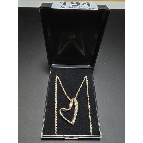 194 - 925 Silver heart pendant inset with crystal CZ stone on a 18 inch 925 Silver chain in clean conditio... 