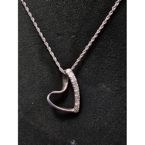 194 - 925 Silver heart pendant inset with crystal CZ stone on a 18 inch 925 Silver chain in clean conditio... 