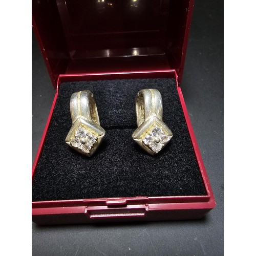 196 - Pair of vintage 925 Silver earrings inset with crystal CZ Stones in clean condition - boxed.