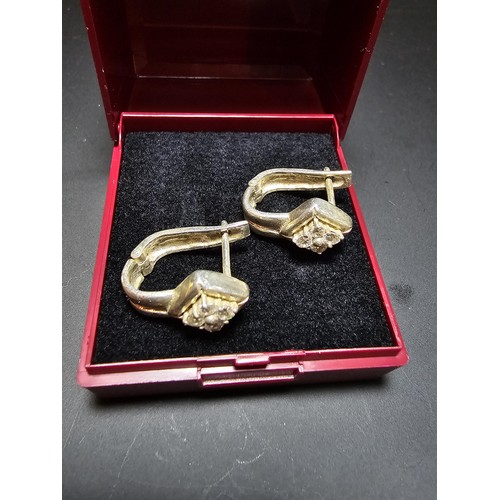 196 - Pair of vintage 925 Silver earrings inset with crystal CZ Stones in clean condition - boxed.