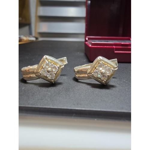 196 - Pair of vintage 925 Silver earrings inset with crystal CZ Stones in clean condition - boxed.