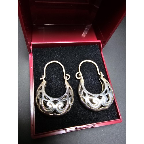 197 - Pair of 925 Silver drop earrings with a pierced design in clean condition - boxed.