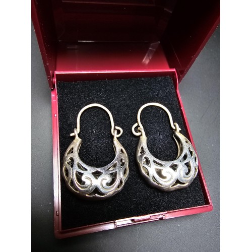 197 - Pair of 925 Silver drop earrings with a pierced design in clean condition - boxed.