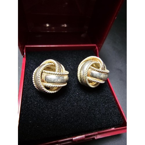 199 - Pair of ornate 925 Silver large knot formed stud earrings in clean condition - boxed.