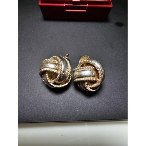 199 - Pair of ornate 925 Silver large knot formed stud earrings in clean condition - boxed.