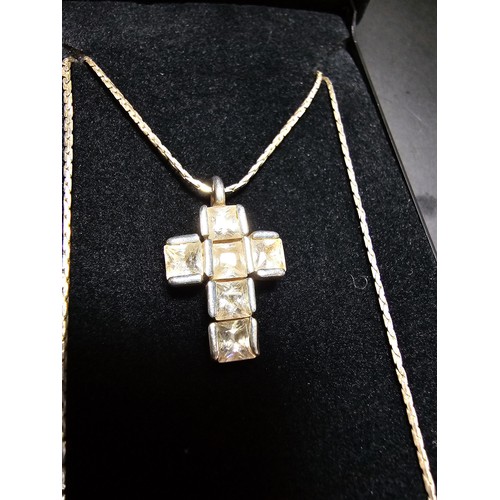 200 - 925 Silver cross pendant inset with crystal CZ stones on a 16 inch 925 Silver chain in clean conditi... 