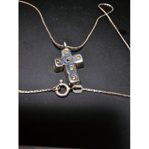 200 - 925 Silver cross pendant inset with crystal CZ stones on a 16 inch 925 Silver chain in clean conditi... 