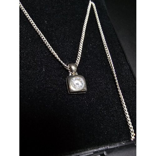 202 - 925 Silver Solitaire pendant inset with a large sparkly CZ crystal stone set on a 18 inch 925 Silver... 