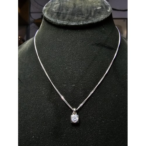 202 - 925 Silver Solitaire pendant inset with a large sparkly CZ crystal stone set on a 18 inch 925 Silver... 