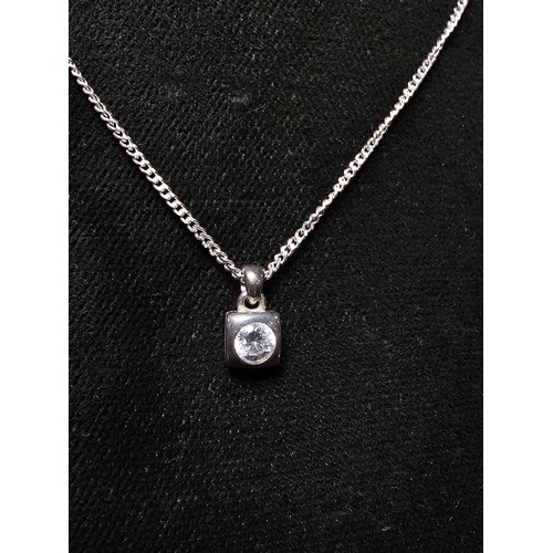 202 - 925 Silver Solitaire pendant inset with a large sparkly CZ crystal stone set on a 18 inch 925 Silver... 