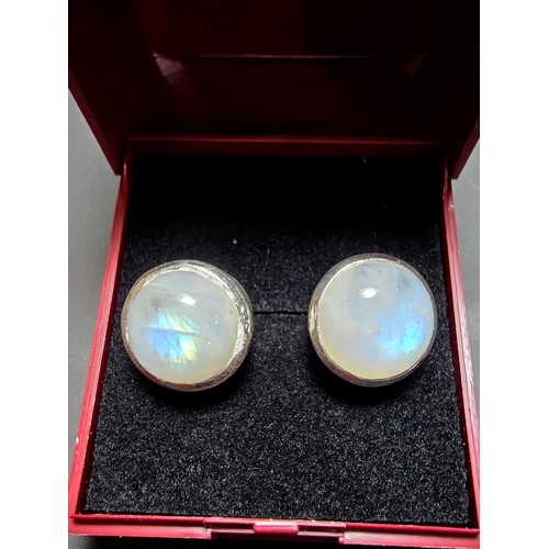 203 - Pair of Large 925 Silver stud earrings inset with spectrolite stones presenting excellent flashing r... 