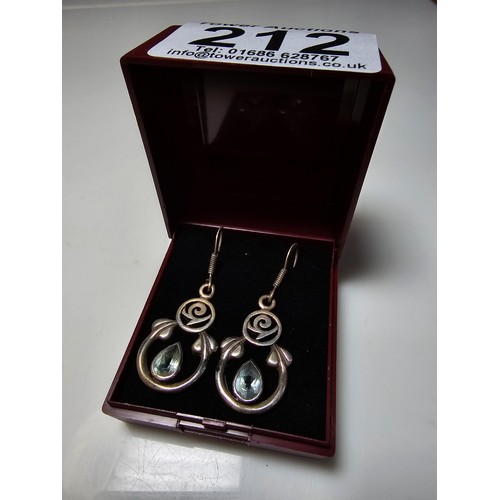 212 - Pair of ornate 925 Silver drop earrings inset with blue topaz stones in the Charles Rennie Mackintos... 