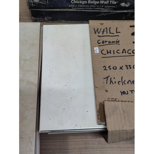 393 - 4 sealed boxes of Chicago beige wall tiles along with 15 extra tiles, each tile measures 25cm x 33cm... 