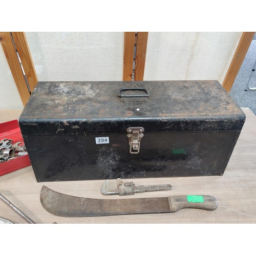 394 - A large metal tool box containing a large quantity of tools including mole grips, files, spanners, a... 