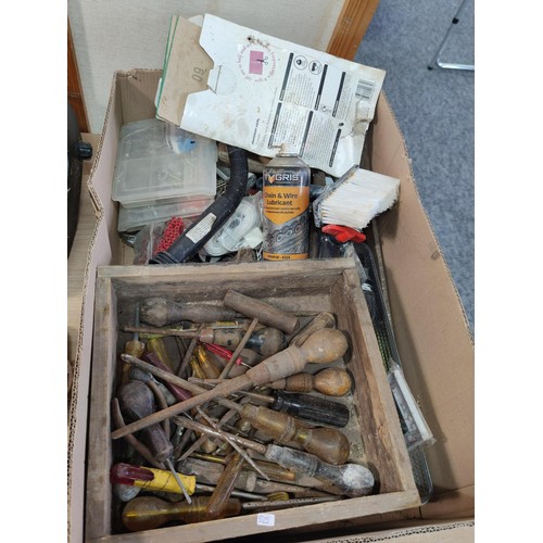 399 - 2 boxes containing a large collection of shed odds including augers, basin wrench, grinding disks, w... 