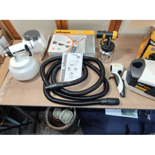 410 - A boxed as new Wagner paint sprayer along with a Wagner handle extension complete with accessories, ... 