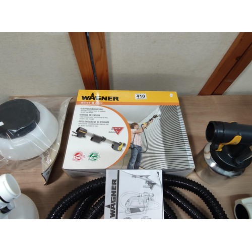 410 - A boxed as new Wagner paint sprayer along with a Wagner handle extension complete with accessories, ... 