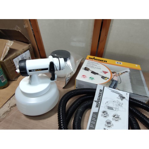 410 - A boxed as new Wagner paint sprayer along with a Wagner handle extension complete with accessories, ... 