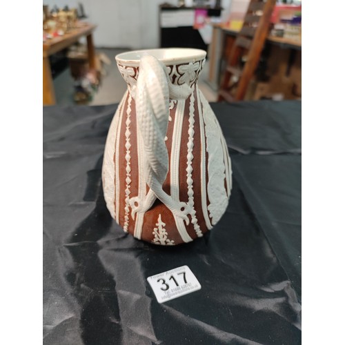 317 - 1800's W.B.Corbridge brownfield cashmere earthen ware pitcher with relief design with a registered d... 