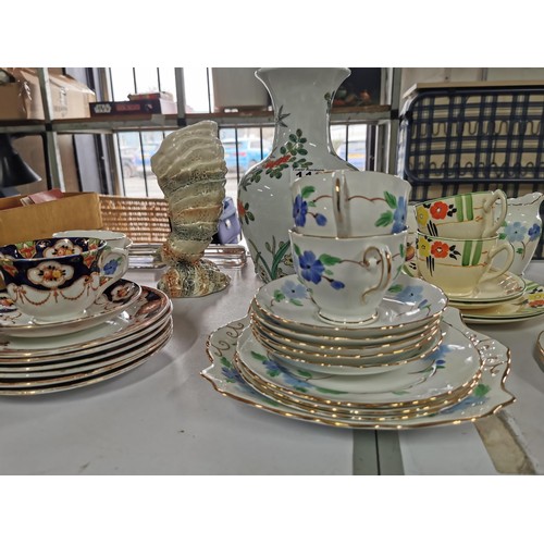 110 - A large quantity of part tea sets to include a mid winter 18 piece set, a Colclough floral design 11... 