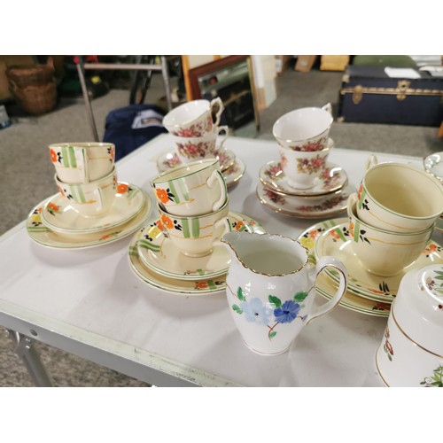 110 - A large quantity of part tea sets to include a mid winter 18 piece set, a Colclough floral design 11... 