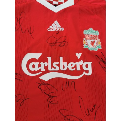 116 - A new with tags Official merchandise Liverpool FC football shirt from 2008 and signed by the players... 