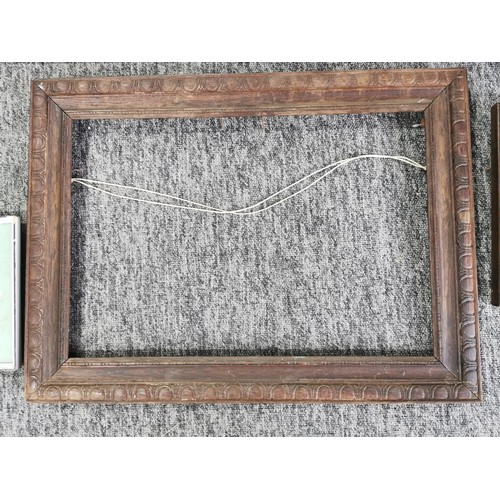 131 - A quantity of 3 oak picture frames 1 with carved detailing to the edges along with a well executed, ... 