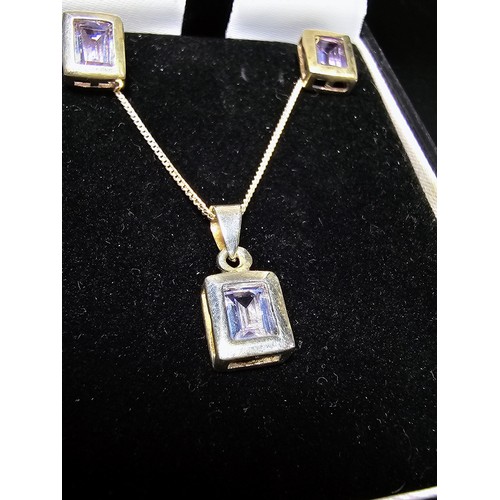 222 - A matching 925 silver necklace and earrings set with Iolite stones, in excellent condition with a 16... 