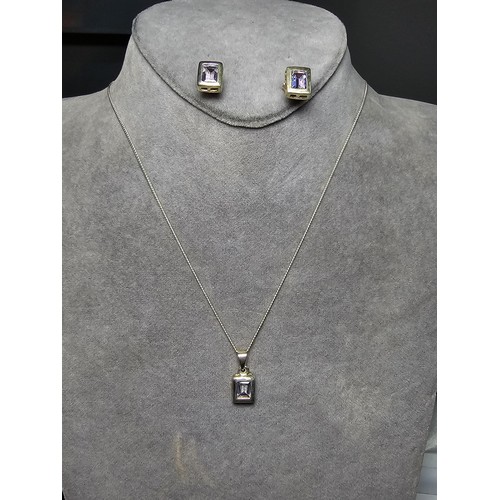 222 - A matching 925 silver necklace and earrings set with Iolite stones, in excellent condition with a 16... 