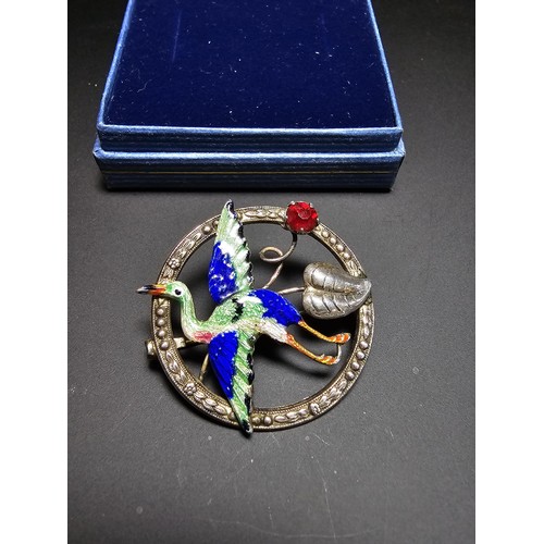 227 - A Stunning Vintage Art Nouveau silver enamel  brooch featuring a crane bird with a red glass jewel, ... 