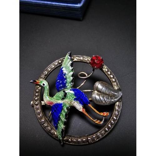 227 - A Stunning Vintage Art Nouveau silver enamel  brooch featuring a crane bird with a red glass jewel, ... 