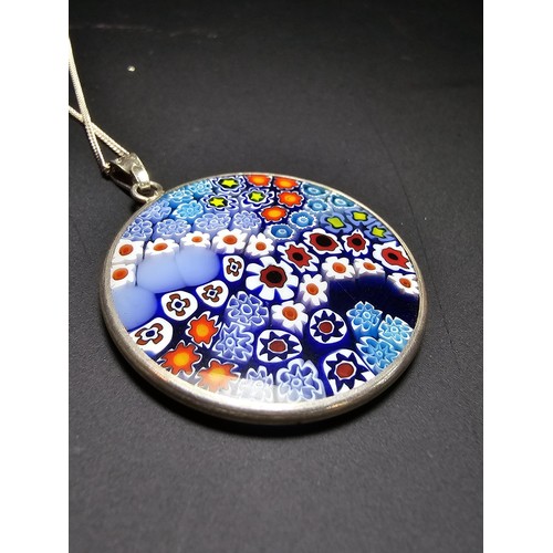 228 - A good quality marked 925 silver Murano glass millefiori double sided pendant on an 18