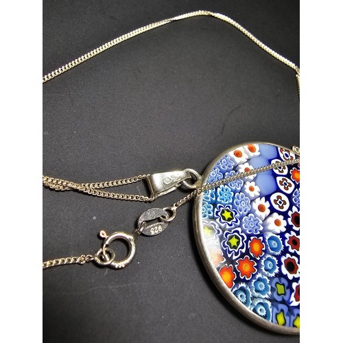 228 - A good quality marked 925 silver Murano glass millefiori double sided pendant on an 18