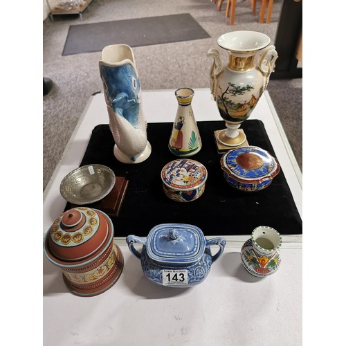 143 - A quantity of collectables including a studio pottery urn a Grecian style hand painted urn, a 2 tone... 