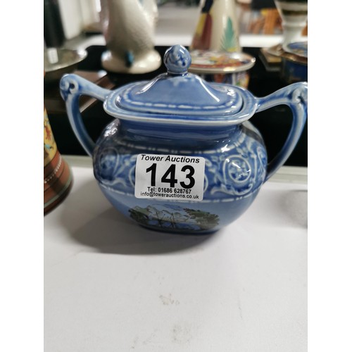 143 - A quantity of collectables including a studio pottery urn a Grecian style hand painted urn, a 2 tone... 