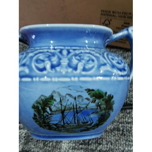 143 - A quantity of collectables including a studio pottery urn a Grecian style hand painted urn, a 2 tone... 