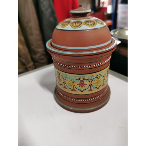 143 - A quantity of collectables including a studio pottery urn a Grecian style hand painted urn, a 2 tone... 