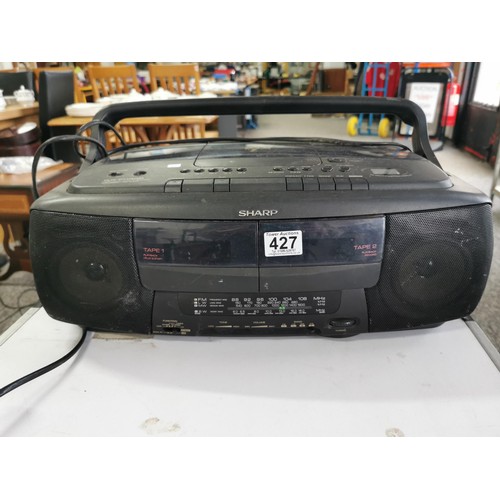 427 - A Sharp portable radio cassette player with five CD auto changer, model WQ-CH400 complete with power... 