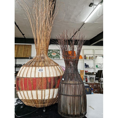 433 - A large tabletop lamp with a natural woven African fabric lamb along with a tall reed formed African... 