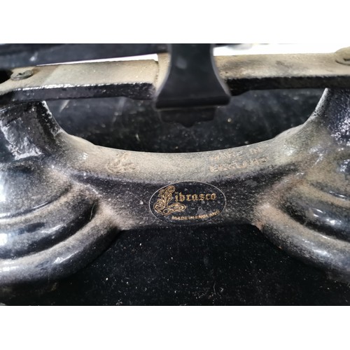 436 - A set of vintage Librasco cast iron scales complete with brass pans and weights. Weight from a quart... 