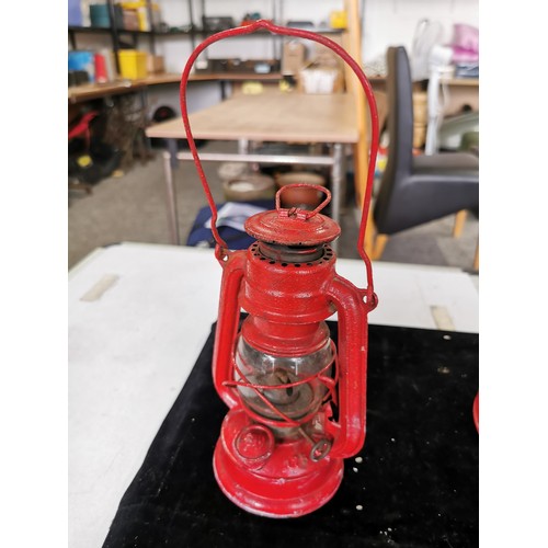 437 - A vintage superbaby oil lamp in red along with a Desmo radilam paraffin heater, both in good order. ... 