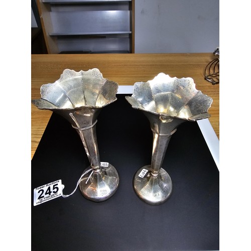 245 - 2x hallmarked silver trumpet vases, with weighted bases, both are hallmarked to the base, the weight... 